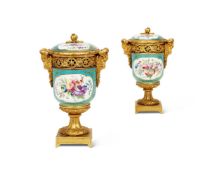 A PAIR OF ORMOLU MOUNTED SÈVRES STYLE POT-POURRI VASES AND COVERS