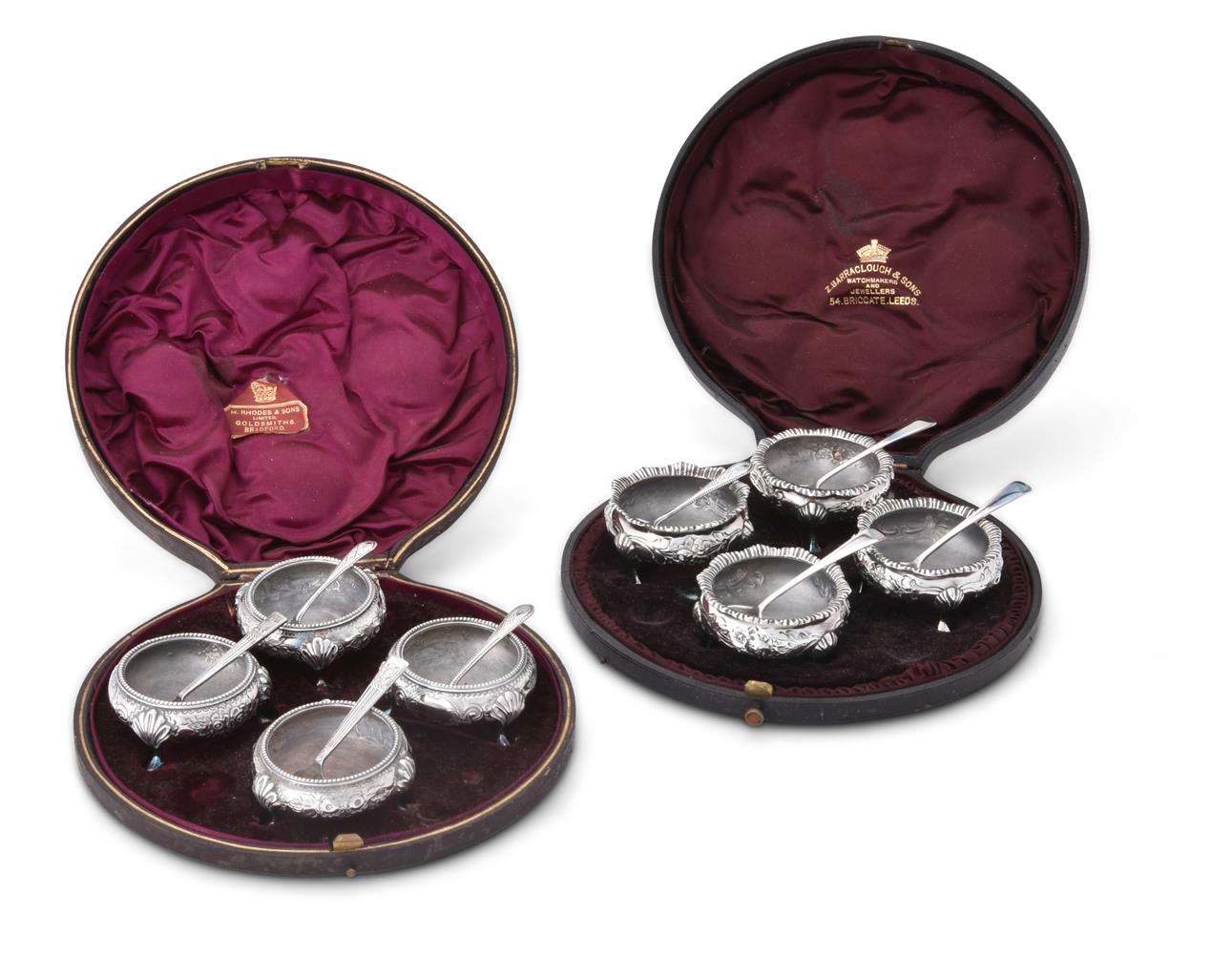 TWO MATCHED SETS OF FOUR VICTORIAN SILVER CAULDRON SALT CELLARS