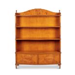 A SATINWOOD WATERFALL OPEN BOOKCASE