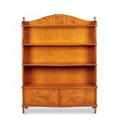 A SATINWOOD WATERFALL OPEN BOOKCASE