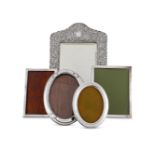 FIVE VARIOUS SILVER FRAMES THE FIRST WITH A BEVELLED MIRROR BY HENRY MATTHEWS