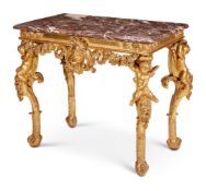 A EUROPEAN CARVED GILTWOOD MARBLE TOPPED SIDE TABLE