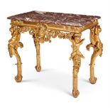 A EUROPEAN CARVED GILTWOOD MARBLE TOPPED SIDE TABLE