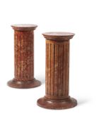 A PAIR OF FAUX RED MARBLE PEDESTALS, EARLY 20TH CENTURY