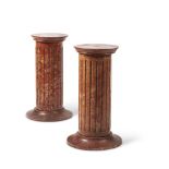 A PAIR OF FAUX RED MARBLE PEDESTALS, EARLY 20TH CENTURY