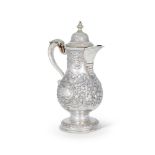 A MID 18TH CENTURY IRISH SILVER BALUSTER COFFEE POT BY STEPHEN WALSH OF CORK