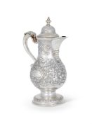 A MID 18TH CENTURY IRISH SILVER BALUSTER COFFEE POT BY STEPHEN WALSH OF CORK