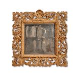 AN ITALIAN CARVED GILTWOOD WALL MIRROR, LATE 19TH CENTURY