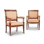 A PAIR OF FRENCH MAHOGANY AND ORMOLU MOUNTED OPEN ARMCHAIRS