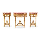 A SUITE OF THREE FRENCH GILTWOOD CONSOLE TABLES