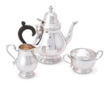 A SILVER BALUSTER THREE PIECE TEA SERVICE