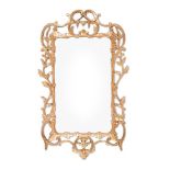 A GEORGE III CARVED GILTWOOD WALL MIRROR, CIRCA 1760