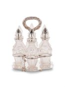 A SILVER HEXAFOIL SIX BOTTLE CRUET STAND