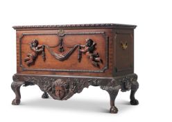 A CARVED MAHOGANY CHEST ON STAND, IN GEORGE II STYLE