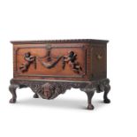 A CARVED MAHOGANY CHEST ON STAND, IN GEORGE II STYLE