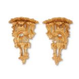 A PAIR OF GEORGE III CARVED GILTWOOD WALL BRACKETS