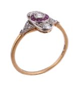 A diamond and ruby panel ring