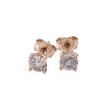 A pair of diamond ear studs