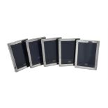 Five silver mounted rectangular photo frames by Kitney & Co.