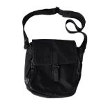 Prada, a black nylon backpack