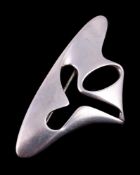 A silver coloured abstract brooch designed by Henning Koppel for Georg Jensen