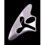 A silver coloured abstract brooch designed by Henning Koppel for Georg Jensen