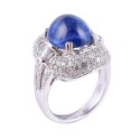 A sapphire and diamond cluster dress ring