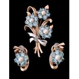 A mid 20th century blue zircon, cultured pearl and rose cut diamond floral spray brooch and matching