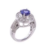 A diamond and tanzanite cluster dress ring