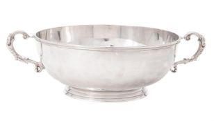 A silver twin handled bowl by Harrods Ltd.
