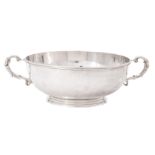 A silver twin handled bowl by Harrods Ltd.