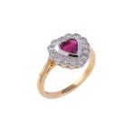 A ruby and diamond heart shaped cluster ring