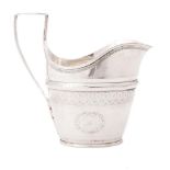 An American silver oval cream jug and sugar basin by Alexander Gordon