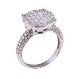 A diamond cluster dress ring