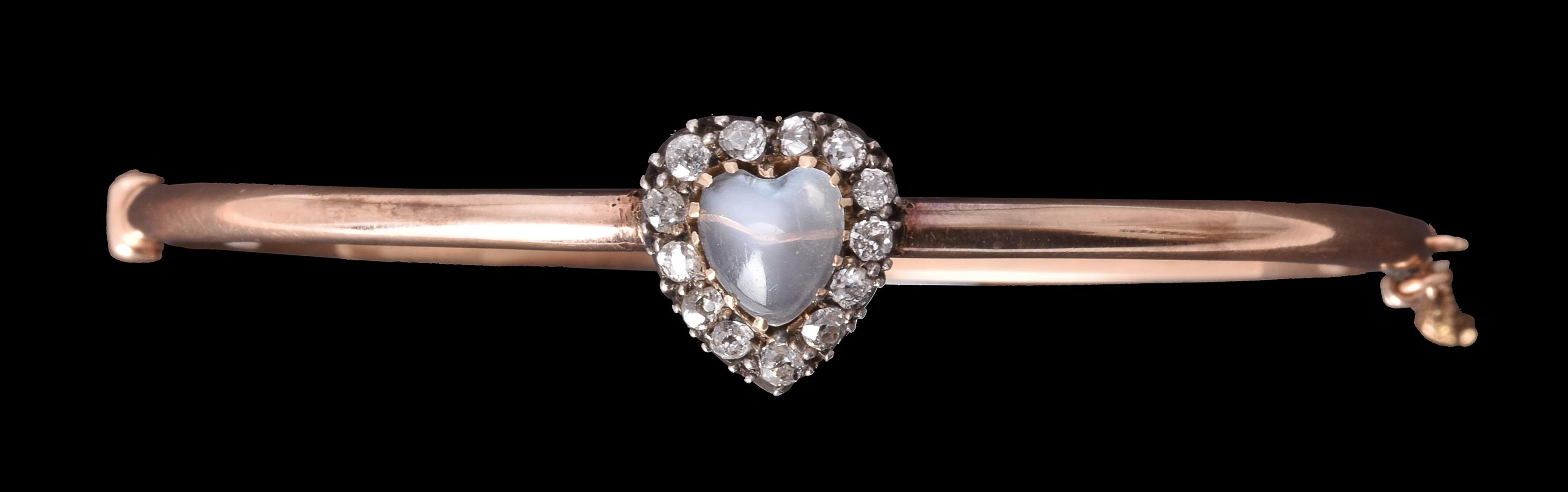 A late Victorian diamond and moonstone hinged bangle