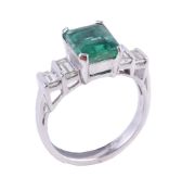 An emerald and diamond five stone ring