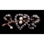 A late Victorian rose cut diamond and pearl mistletoe and heart brooch