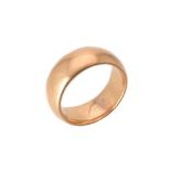An 18 carat gold broad band ring