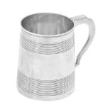 A George III silver slightly tapered mug