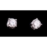 A pair of diamond stud earrings