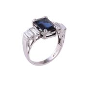 A five stone sapphire and diamond ring