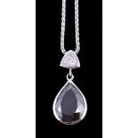 A black diamond and diamond pendant