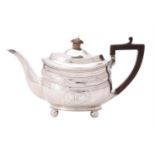 A George III silver oval tea pot