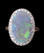 An opal and diamond cluster ring