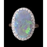 An opal and diamond cluster ring