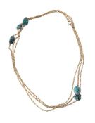 An early 20th century Arts and Crafts turquoise matrix and gold long chain