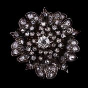 A late 19th century French diamond flower head brooch