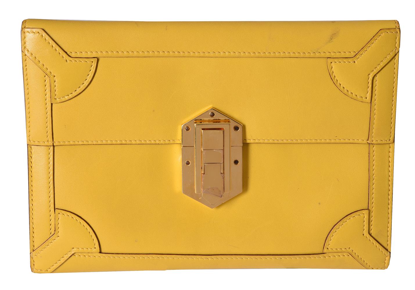 Hermes, a yellow leather clutch bag