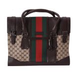 Gucci, a leather and canvas handbag