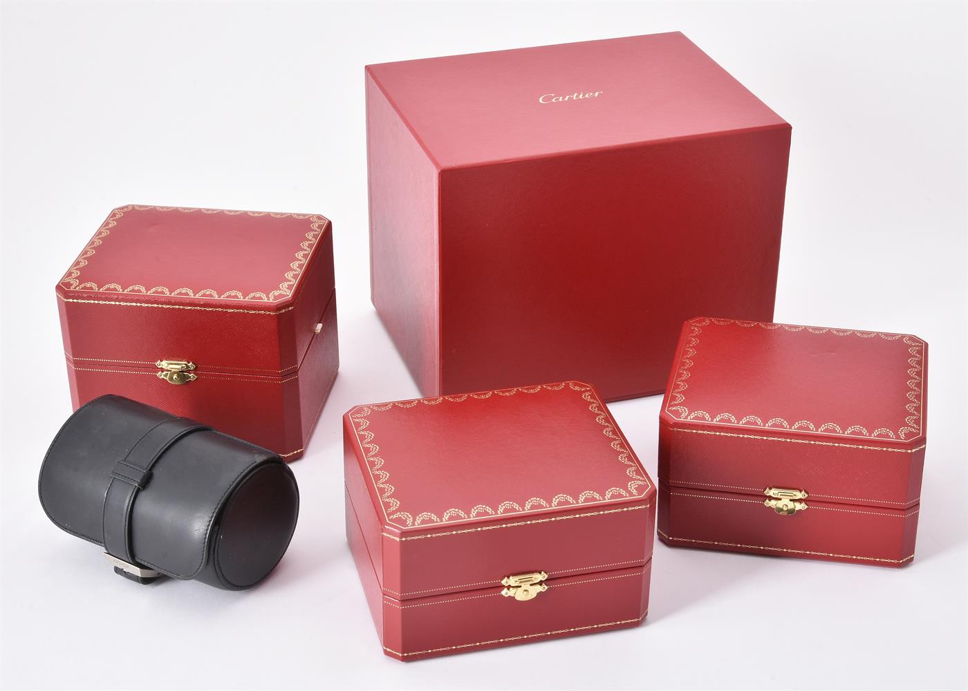 Cartier, a red leather watch box